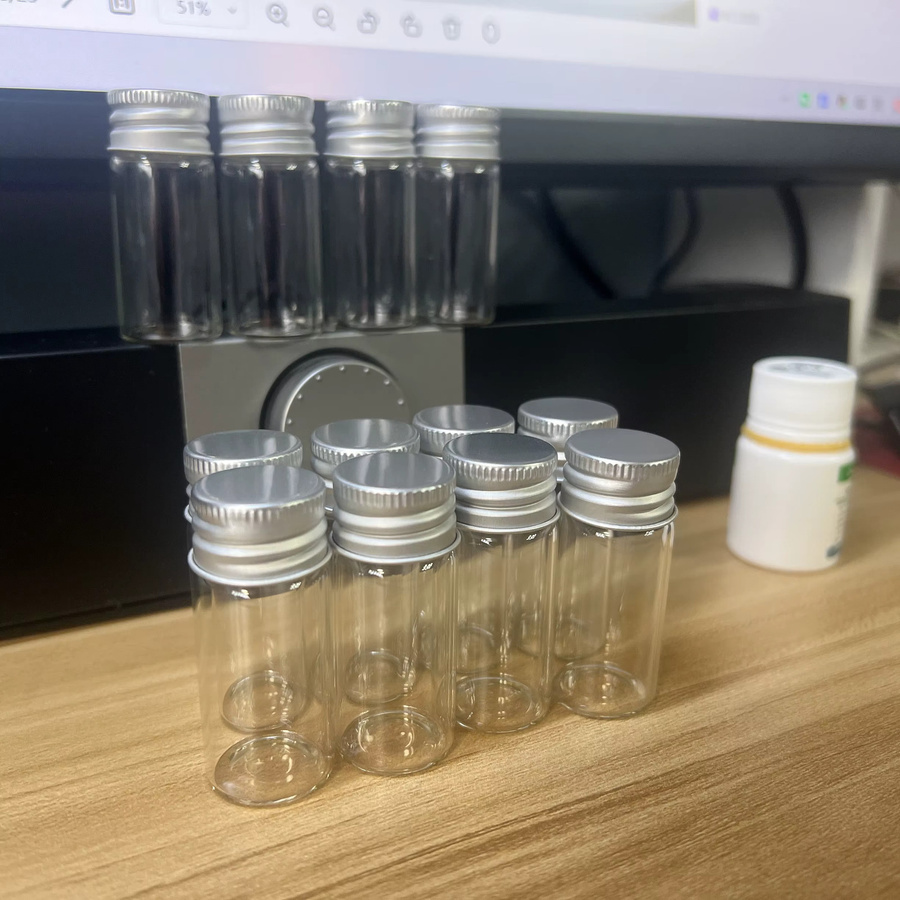 OLOEY Weihnachts-Glasflaschen mit Silbernen Schraubverschluss, transparente Mini-Glasgefäße für Dekoration, Volumen: 10 ml, Durchmesser: 22 mm, Höhe: 50 mm - Bild 5