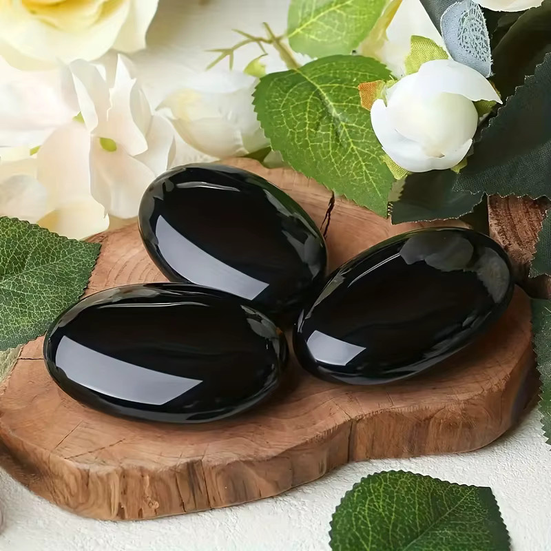 Polierter Obsidiankristall in Schwarz als ovaler Palmenstein für Yoga und Meditation - Bild 3