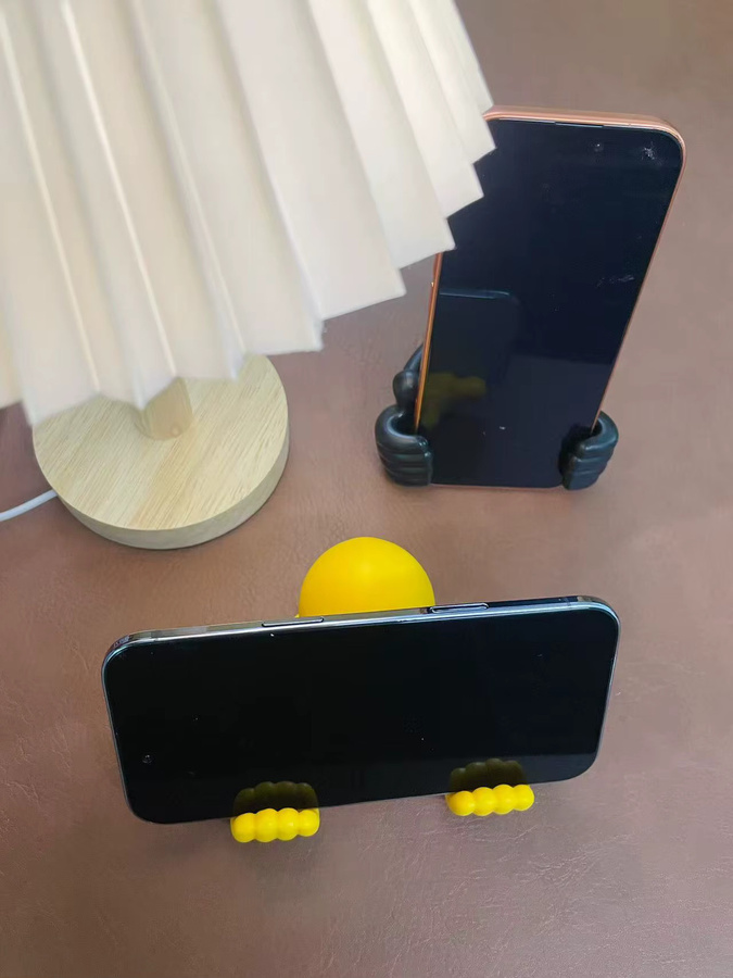 Universeller Desktop-Ständer für Telefone und Tablets mit Smile Face Dekor in Gelb - Bild 2