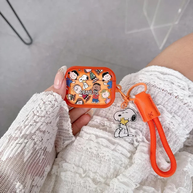 Snoopy und Charlie Brown Cartoon Kopfhörerhülle für Apple AirPods Pro, AirPods 3, 2 und 1 sowie AirPods 4 - Bild 1