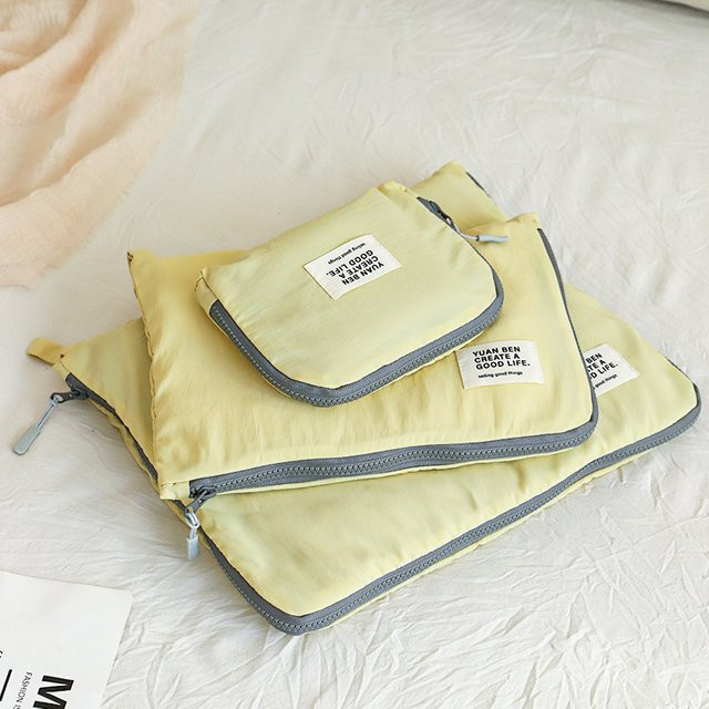 unkikAA Kompressions-Packwürfel für Reisegepäck und Rucksack zur Kleiderorganisation in Weiß und Gelb - Bild 1