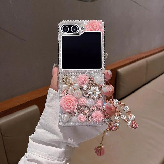 Glitzernde Samsung Galaxy Z Flip Hülle mit 3D Blume, Diamant-Optik und Handgelenkkette in Pink und Multicolour für Galaxy Z Flip 6, Z Flip 5, Z Flip 4 und Z Flip 3 - Bild 1