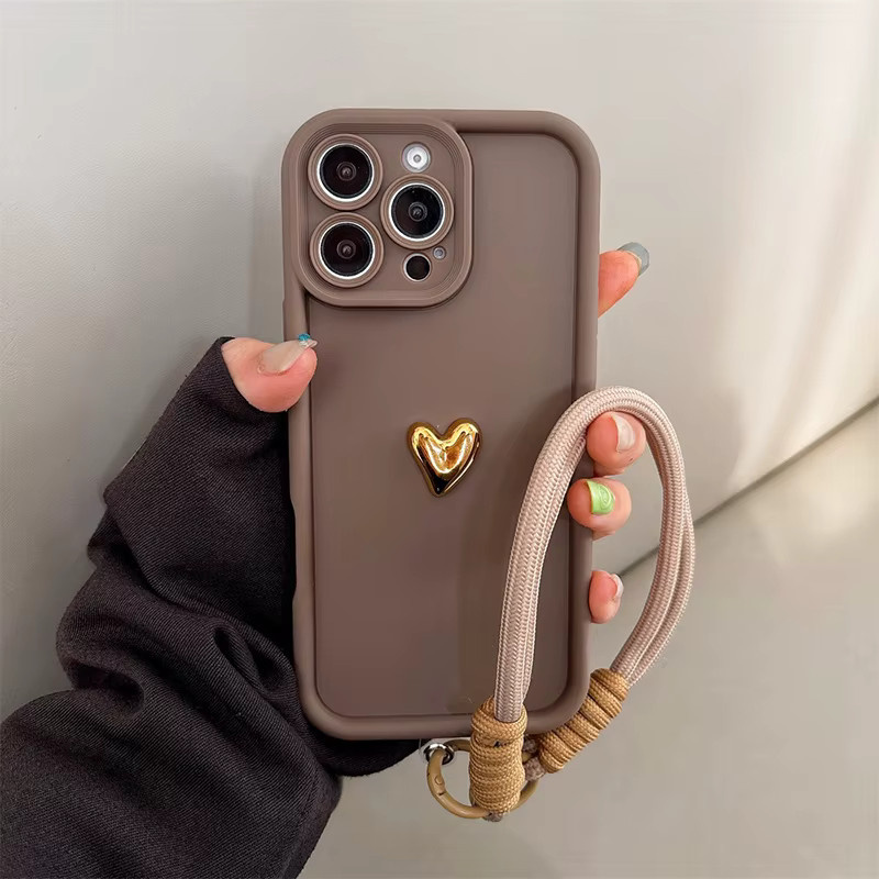 Goldene 3D Herzförmige Schutzhülle mit Handgelenkschlaufe für Apple iPhone Modelle in Beige und Gold - Bild 3