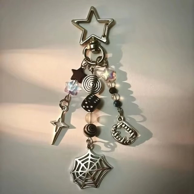 YUMEI Schlüsselanhänger Spinnennetz Spiralstern, Metall - Bild 1