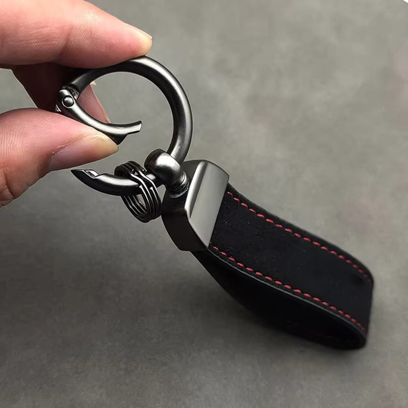Schlüsselanhänger Wildleder, Quattro, Unisex - Bild 1