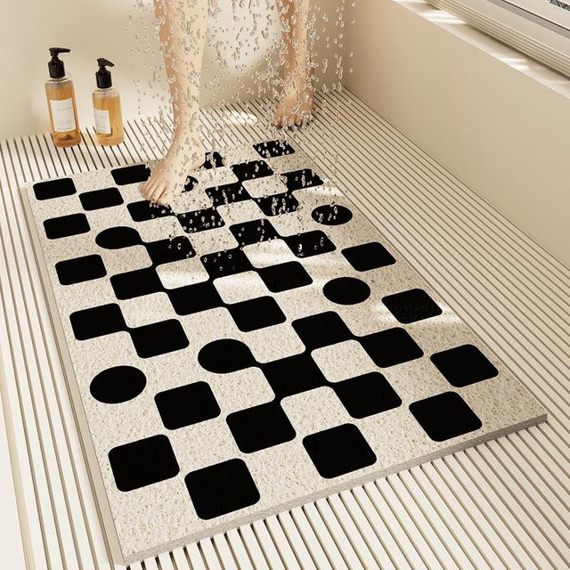 Rutschfeste und wasserdurchlässige Badematte von the BAY in Schwarz mit Streifenmuster, B/T: 70 x 40 cm - Bild 1
