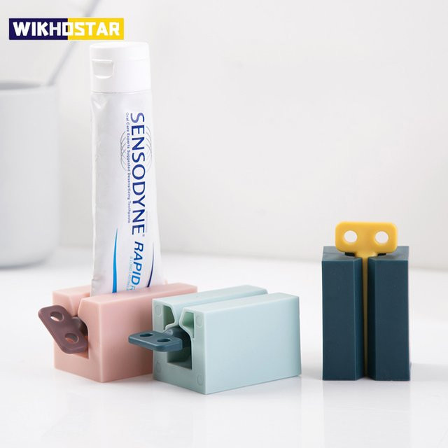 WIKHOSTAR Zahnpasta-Quetscher und Zahnpastaspender als Aufbewahrungsregal für dein Badezimmer-Zubehör aus Kunststoff - Bild 1