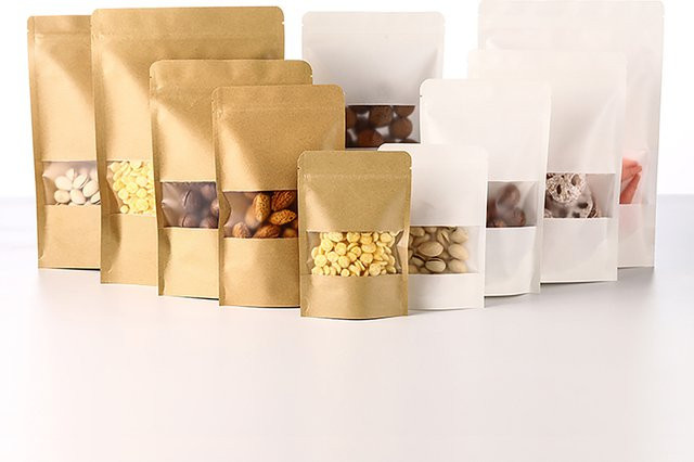 100 Stück Kraftpapier Standbeutel mit Fenster und Reißverschluss in Braun und Gelb für professionelle Verpackungen - Bild 1