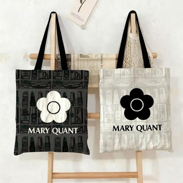 Mary Quant Canvas Tragetasche in Schwarz mit doppelseitigem Druck als modische Umhängetasche für Damen - Bild 1