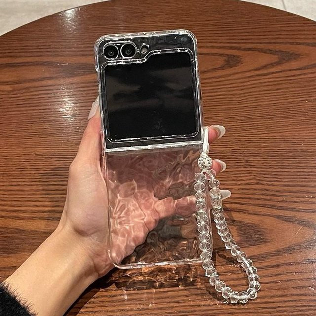 Luxus Wasserwellen Hülle für Samsung Galaxy Z Flip 7 6 5 4 3 5G mit Perlenarmband in Schwarz und Transparent aus weichem TPU - Bild 1