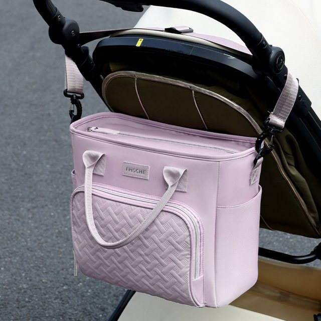 INS Premium Wickeltasche als multifunktionale Thermo-Reisetasche für Babys und Mamas in Schwarz oder Pink - Bild 1