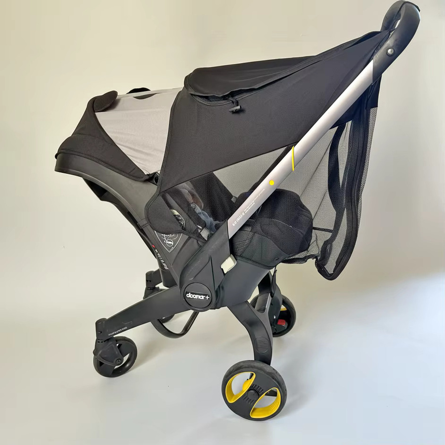 Doona Sonnenschutz und Moskitonetz für Autositz in Schwarz und Multicolour mit UV-Schutz und atmungsaktivem Material - Bild 4