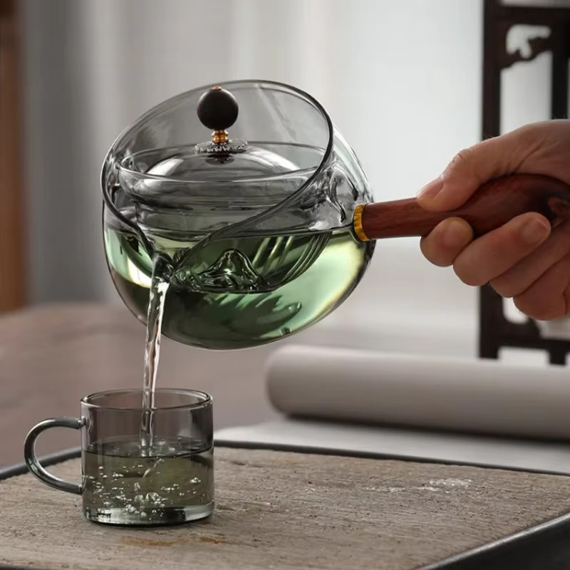 Hitzebeständige Glas-Teekanne mit 360 Grad rotierendem Teebereiter und Holzgriff, transparent - Bild 2