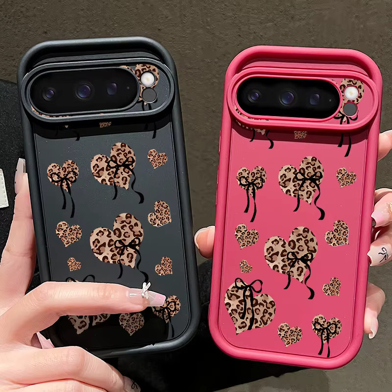 Stoßfeste TPU-Handyhülle mit Leopardenmuster und Herz-Schleife für Google Pixel 10 9 Pro XL 8 7 Pro 9A 8A 7A in Multicolour und Schwarz - Bild 1