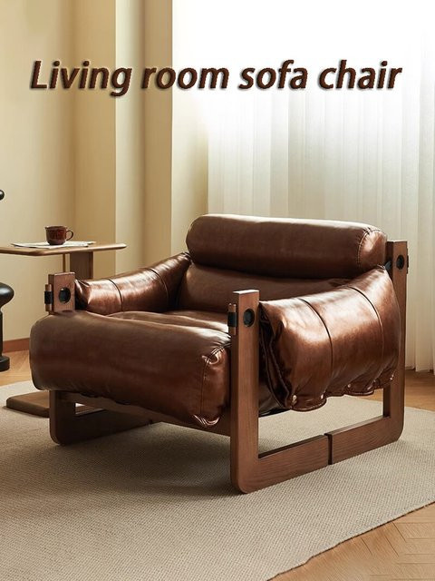 Moderner Lounge Sessel aus Leder von Oeny mit Armlehnen für dein Wohnzimmer in Schwarz oder Braun - Bild 1