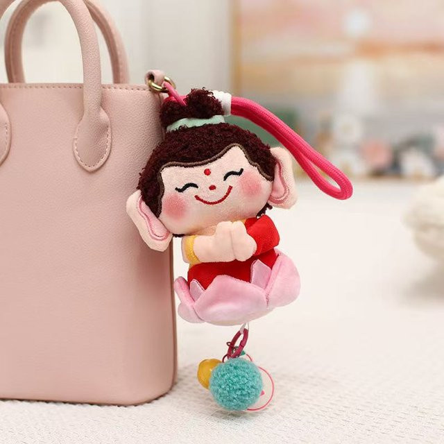 Yiran Health & Beauty Lotus Kleine Buddha Puppe, Plüschtier, 12/15cm, ab 14 Jahren - Bild 1