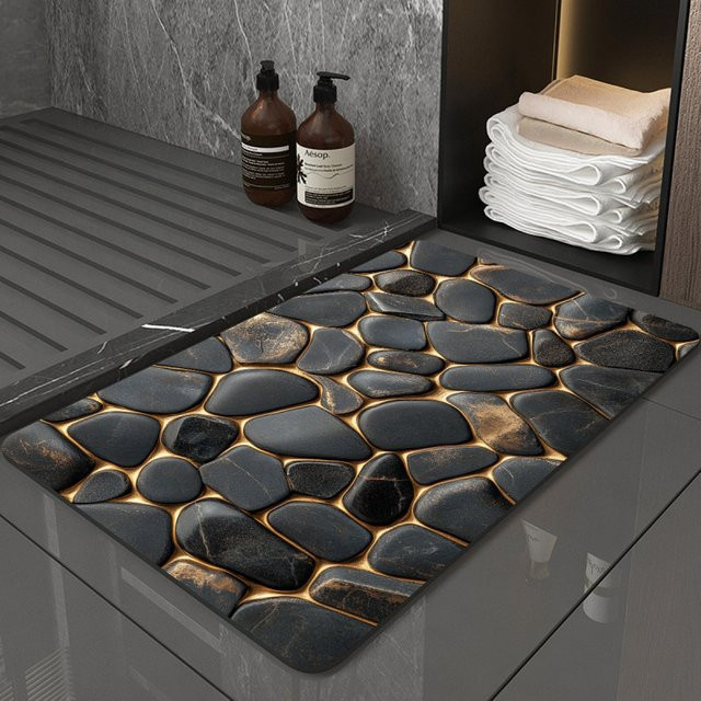 VIKAMA Badezimmerteppich Kieselstein-Design in Schwarz-Gold, wasserabsorbierend und rutschfest - Bild 1