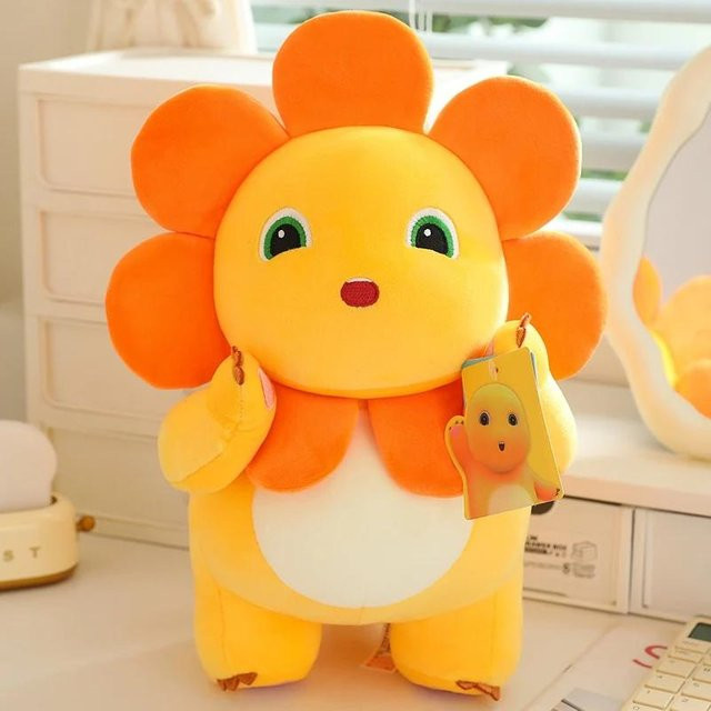 Kidsly Sonnenblume Milchdrache Plüschtier, Dinosaurier, orange, ab 14 Jahre - Bild 1
