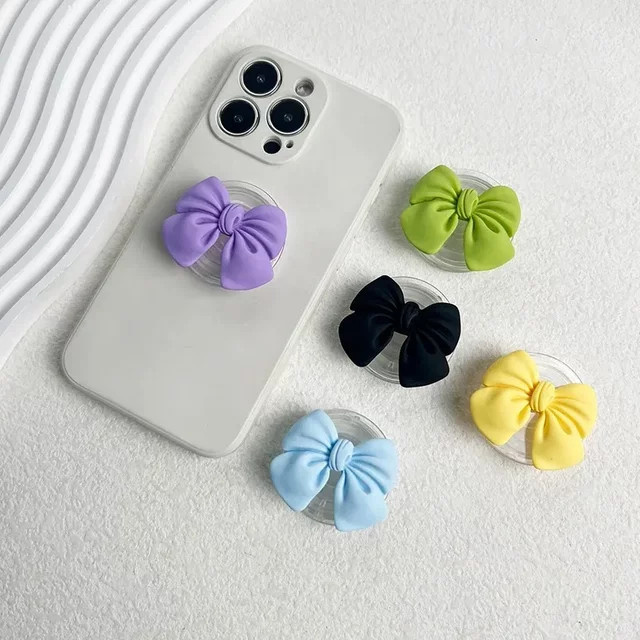 JXSFLYE Griptok Telefonhalterung mit Bowknot Design in Bunt und Schwarz für iPhone und Samsung - Bild 1