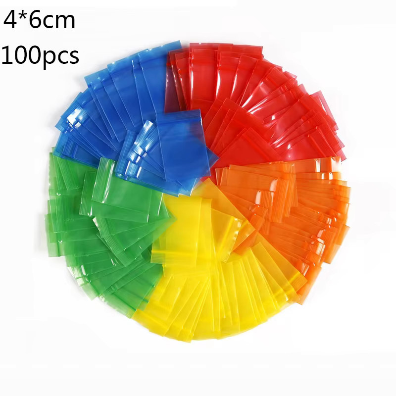 100 Stück wiederverwendbare Zip-Lock-Taschen aus Plastik in schillerndem Multicolour-Design, durchsichtige Holografik-Beutel für Schmuck und Kosmetik, Farbe: Grün/Transparent - Bild 4