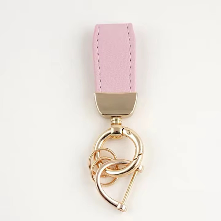 SAISLERWELL Schlüsselanhänger, Gold, Metall, Leder, Unisex - Bild 1