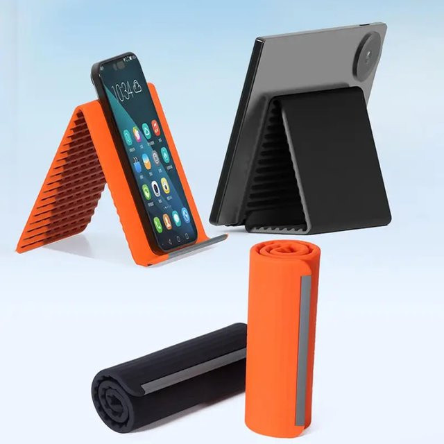 Tragbarer faltbarer Silikon-Handyhalter von Tutew in Schwarz oder Orange, flexibler und mehrfach verstellbarer Handyständer - Bild 1
