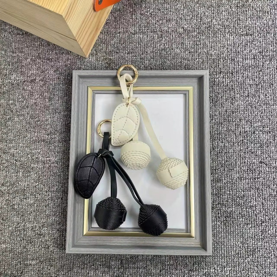 NYXIA Taschenanhänger, PU-gewebter Ball, Kirschball - Bild 2