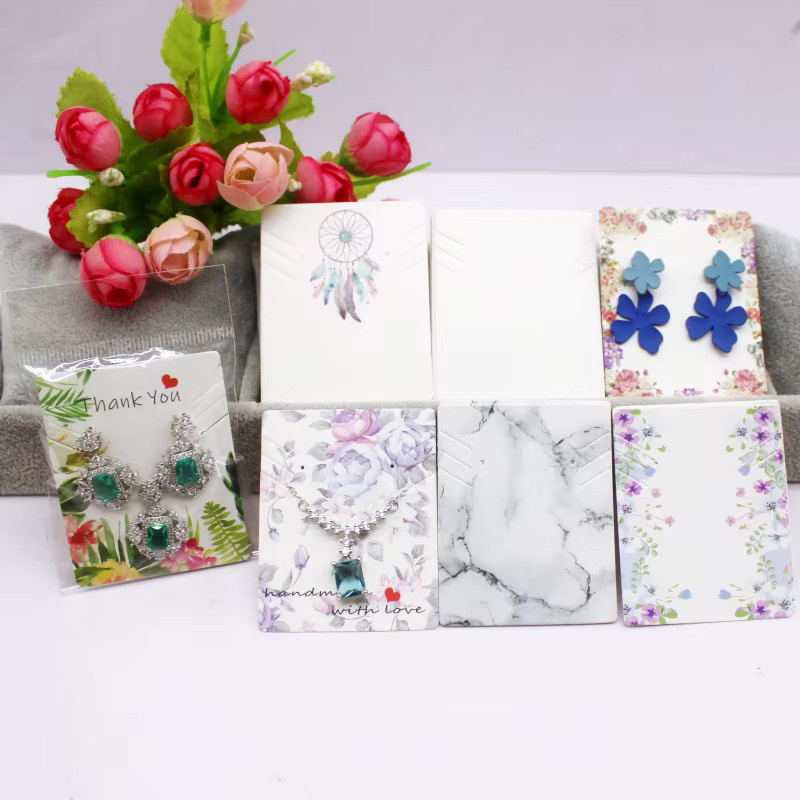 Displaykarten aus weißem Papier für Ohrringe und Halsketten, B/H: 5,1 x 6,3 cm, 50 oder 100 Stück - Bild 1